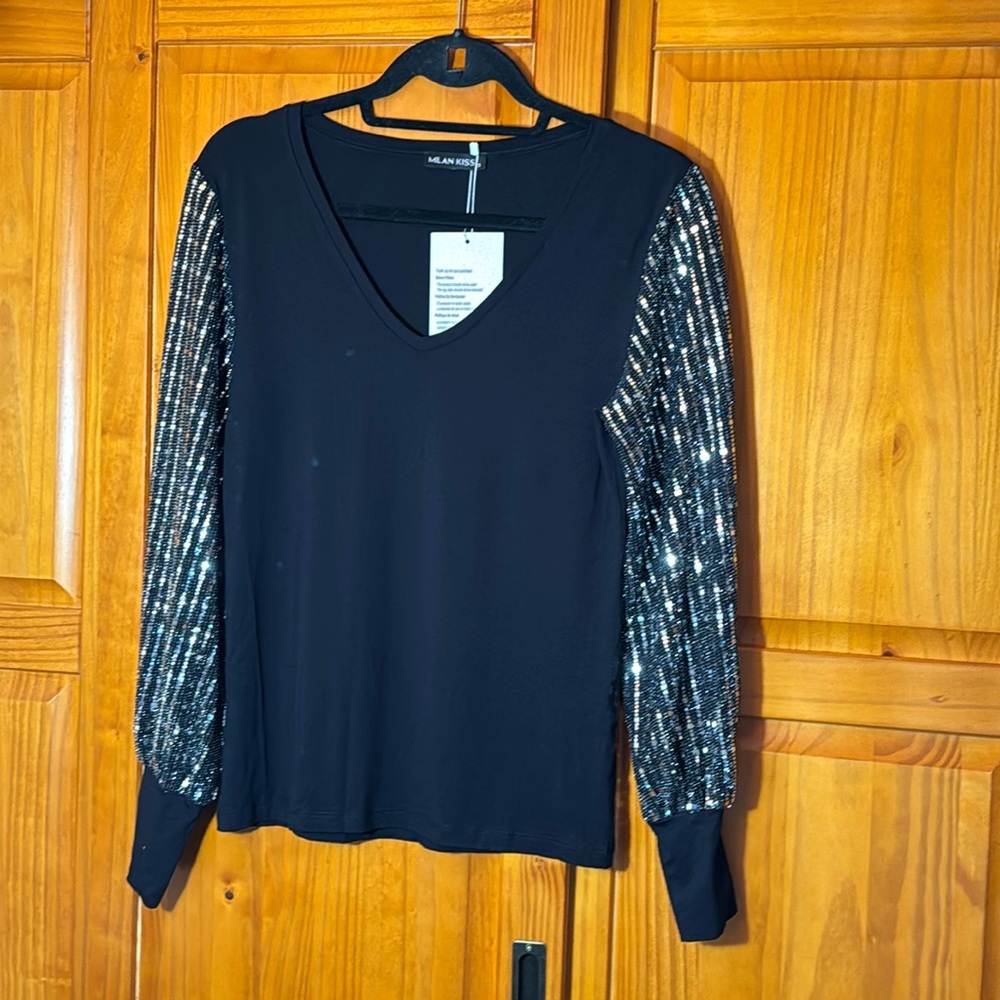 Brand new Black top with sparkle sleeves